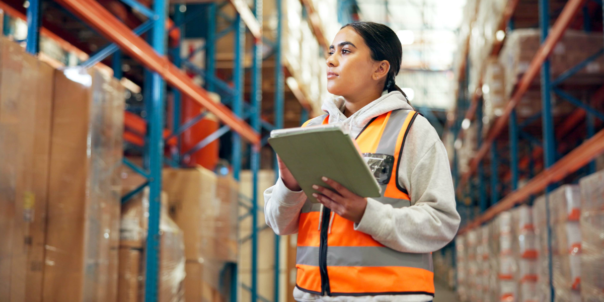 Warehouse Manager Checking Inventory