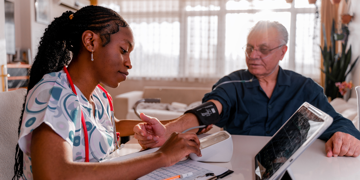 Nurse Taking Blood Pressure at Home